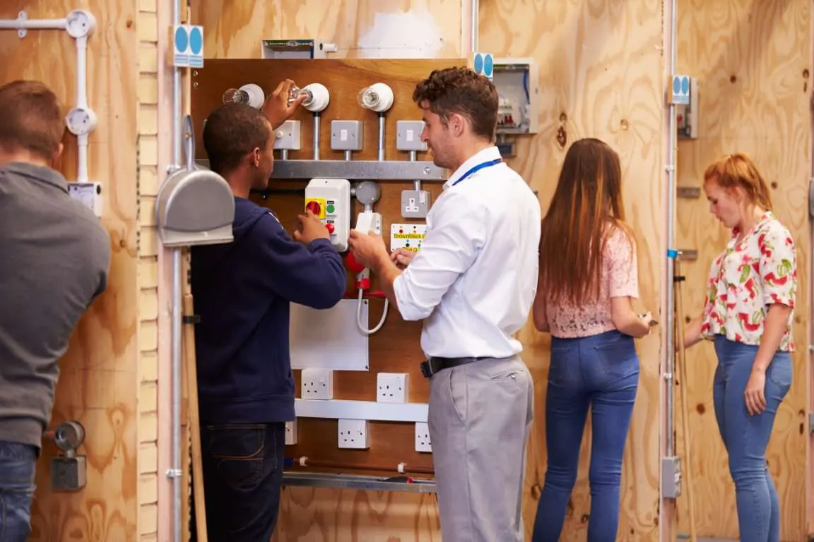 Candidates participating in hands-on trade and technical training